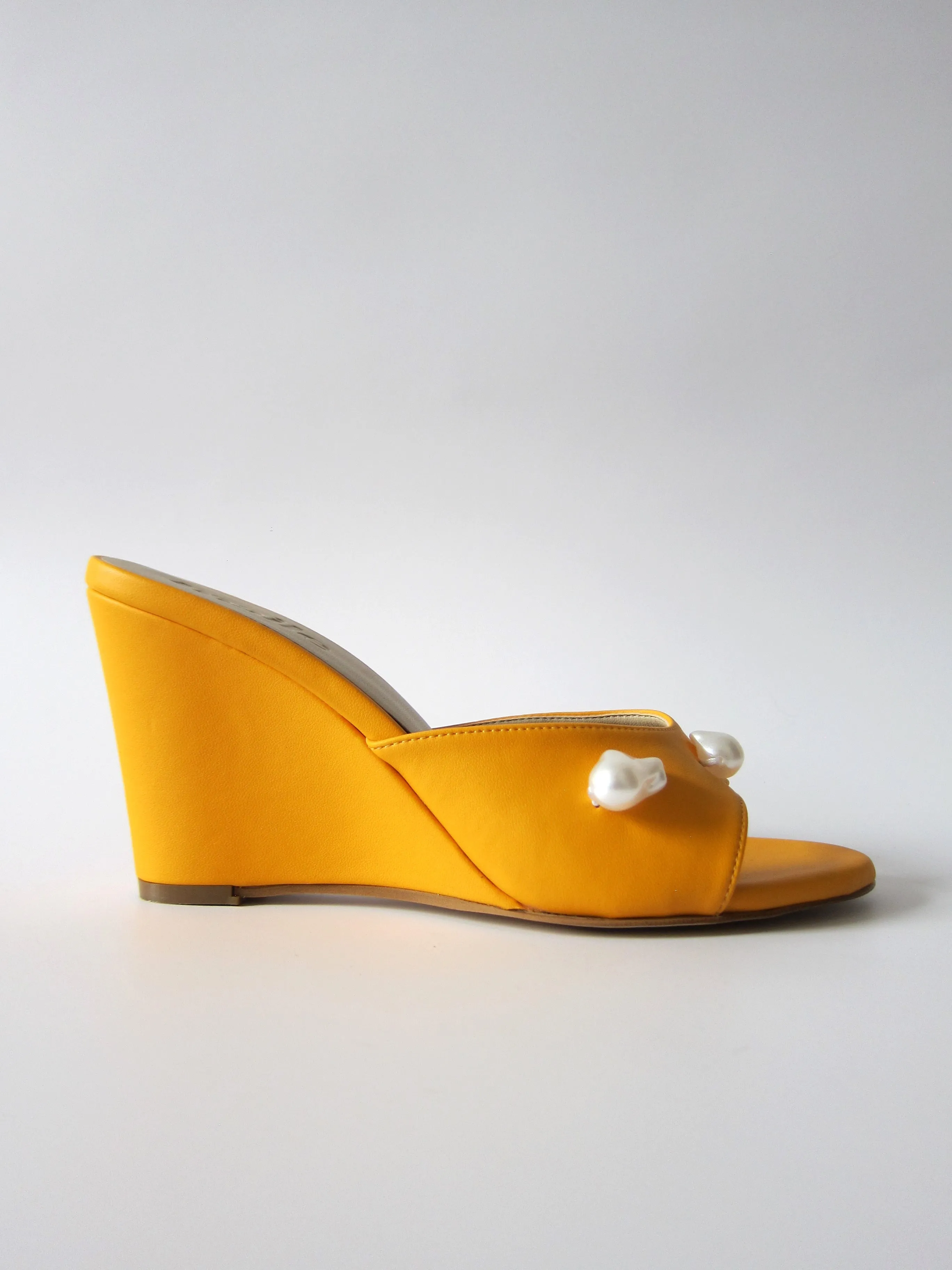 kourtney mango orange wedge