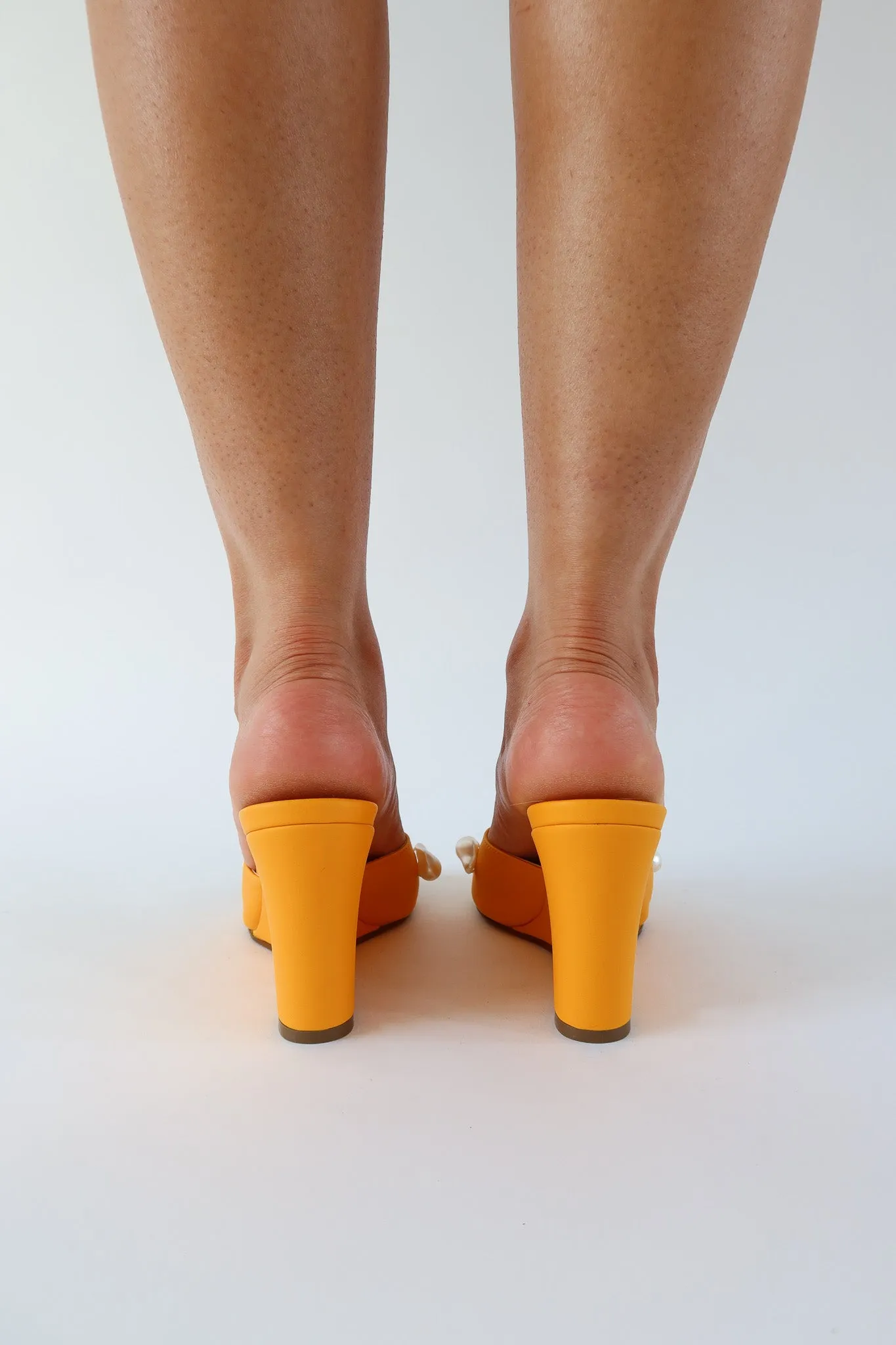 kourtney mango orange wedge