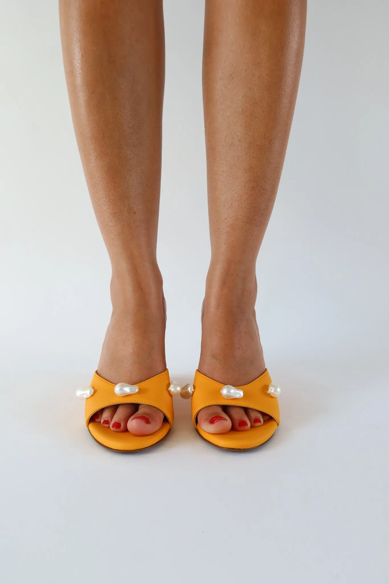 kourtney mango orange wedge