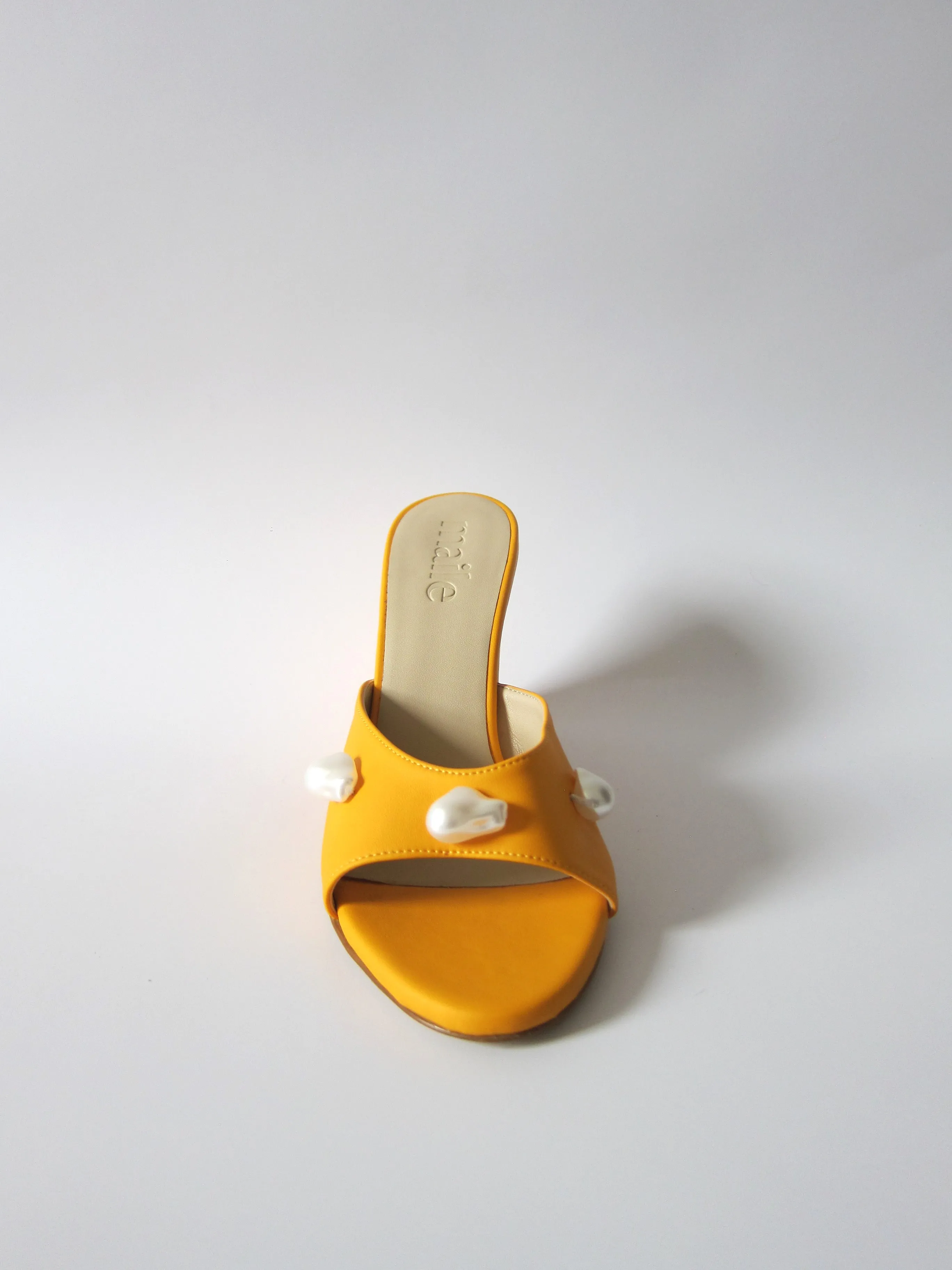 kourtney mango orange wedge